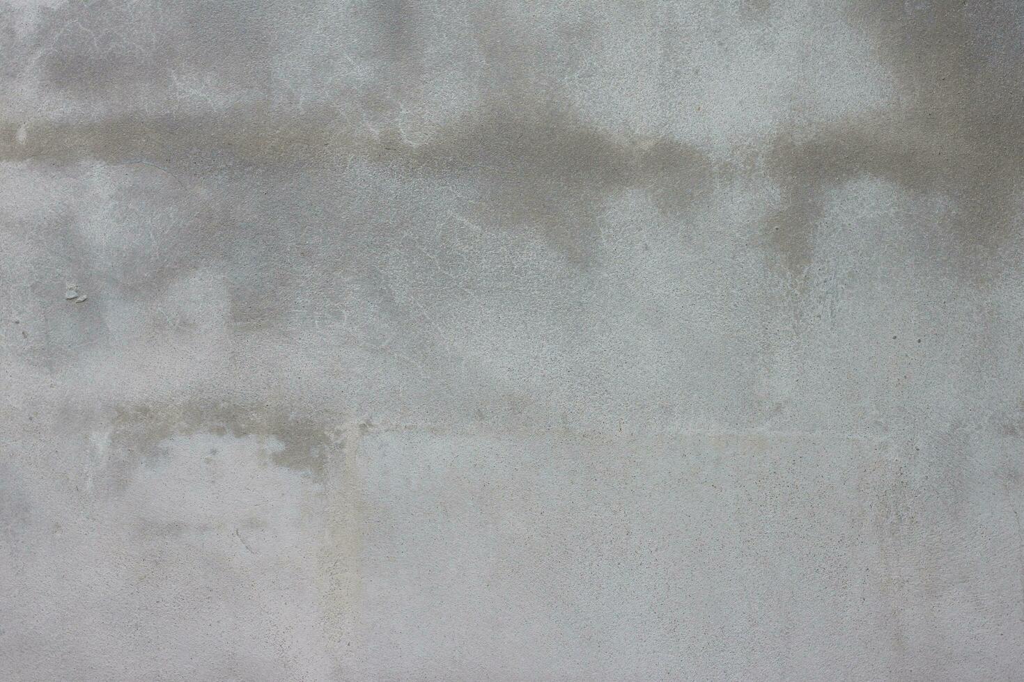 The surface of the old plastered wall is thinly plastered. Not smooth and crack for background. photo
