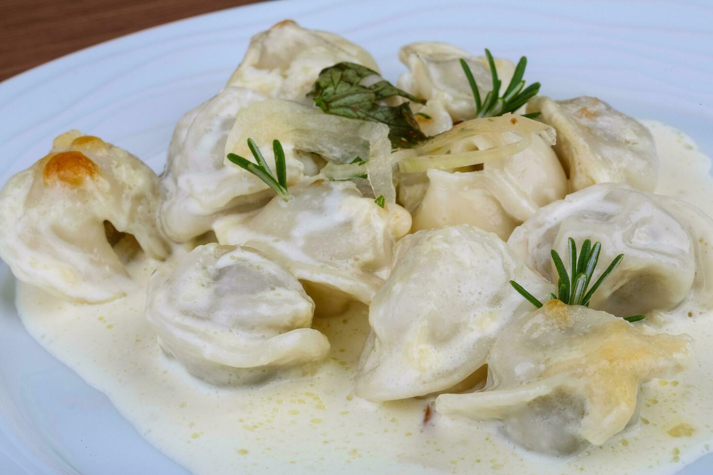 Russian dumplings on the plate close up view photo