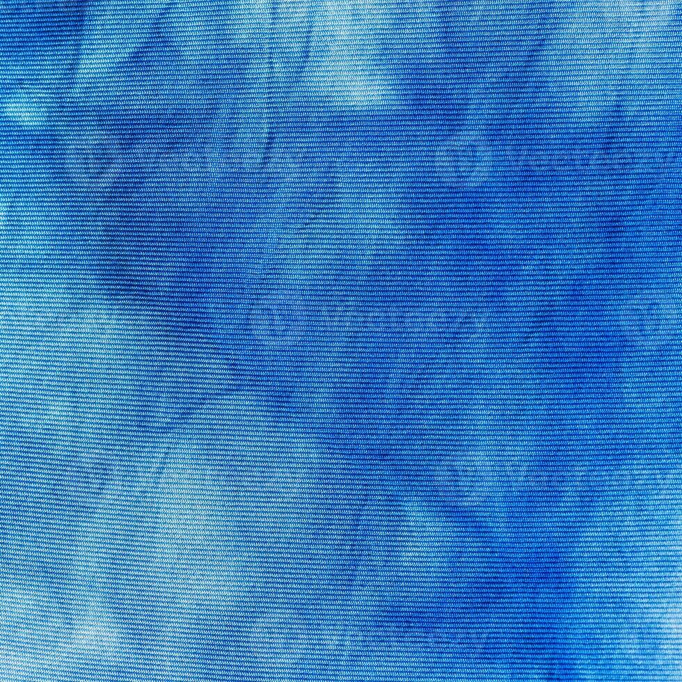 handcrafted tie-dye blue abstract pattern on silk photo