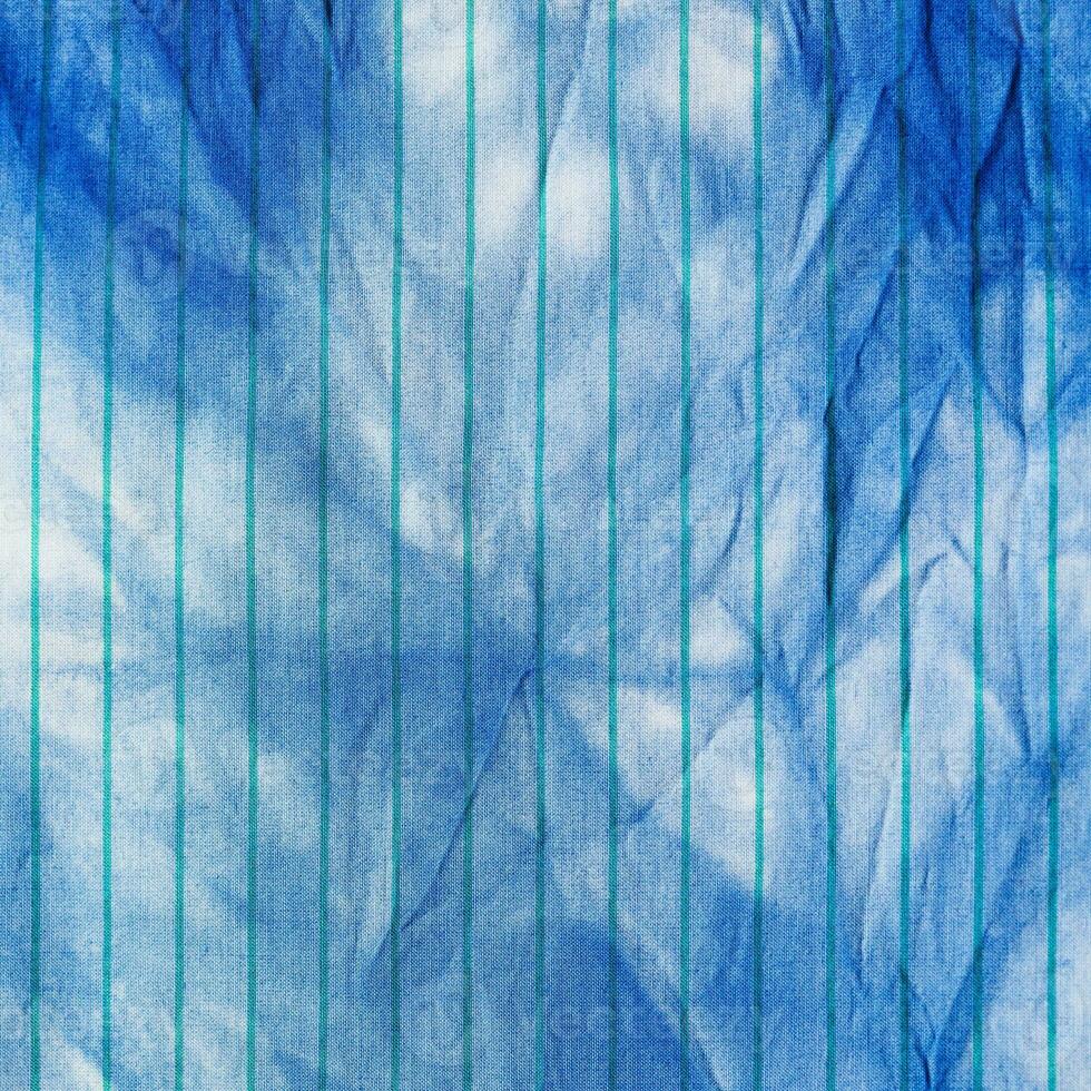 handcrafted Shibori blue abstract pattern on silk photo