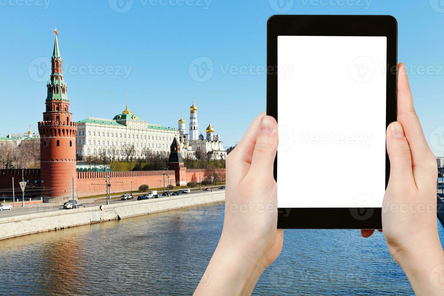 tourist photographs Moscow cityscape with Kremlin photo