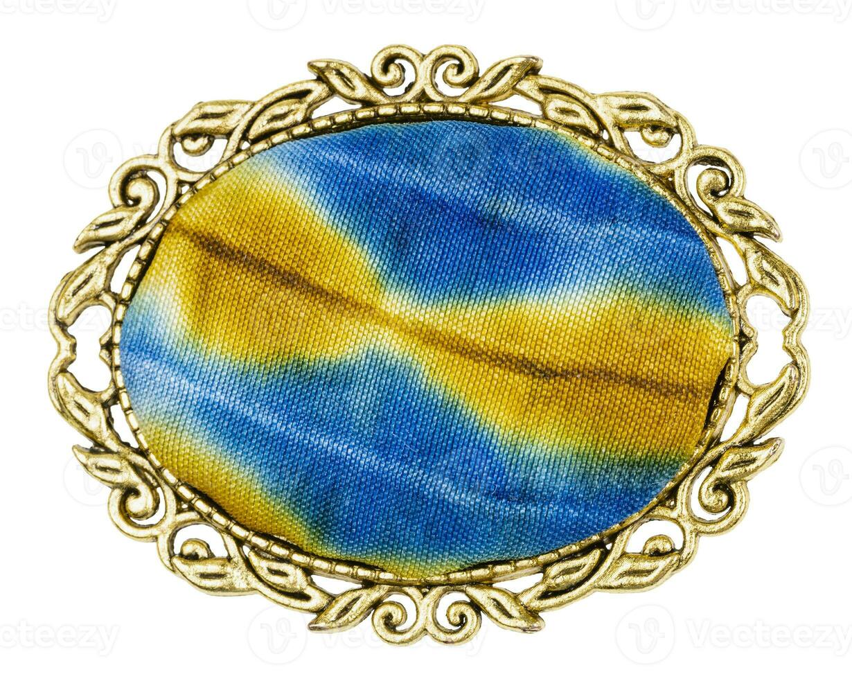 brass brooch with batik hand-painted silk insert photo