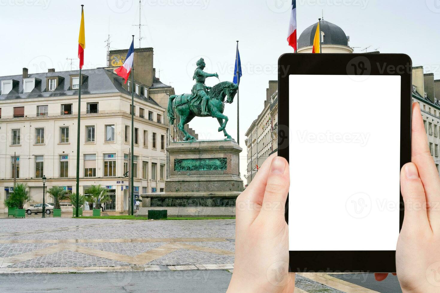 tourist photographs monument Joan of Arc Orleans photo