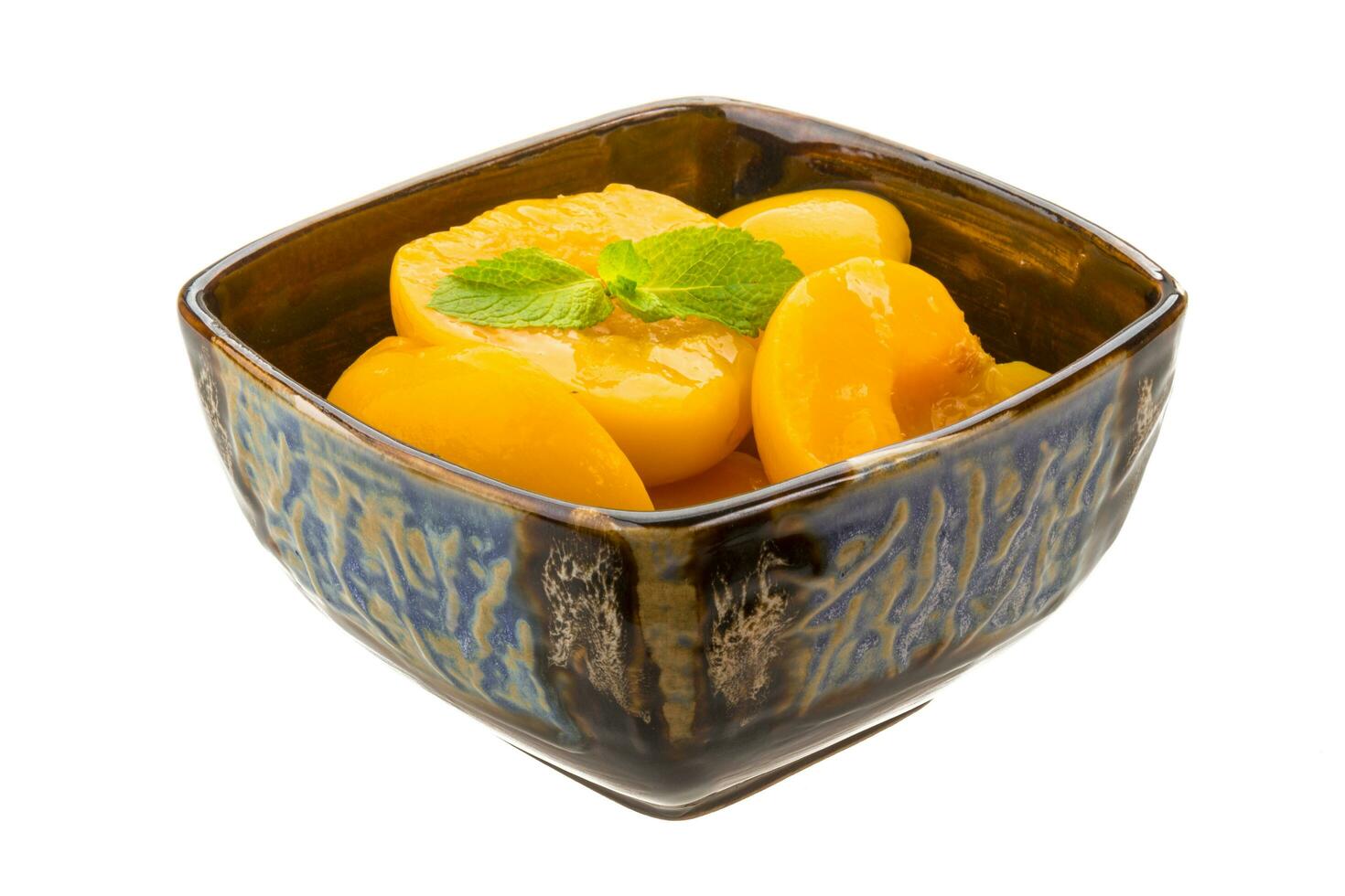 Marinated peaches dish view photo