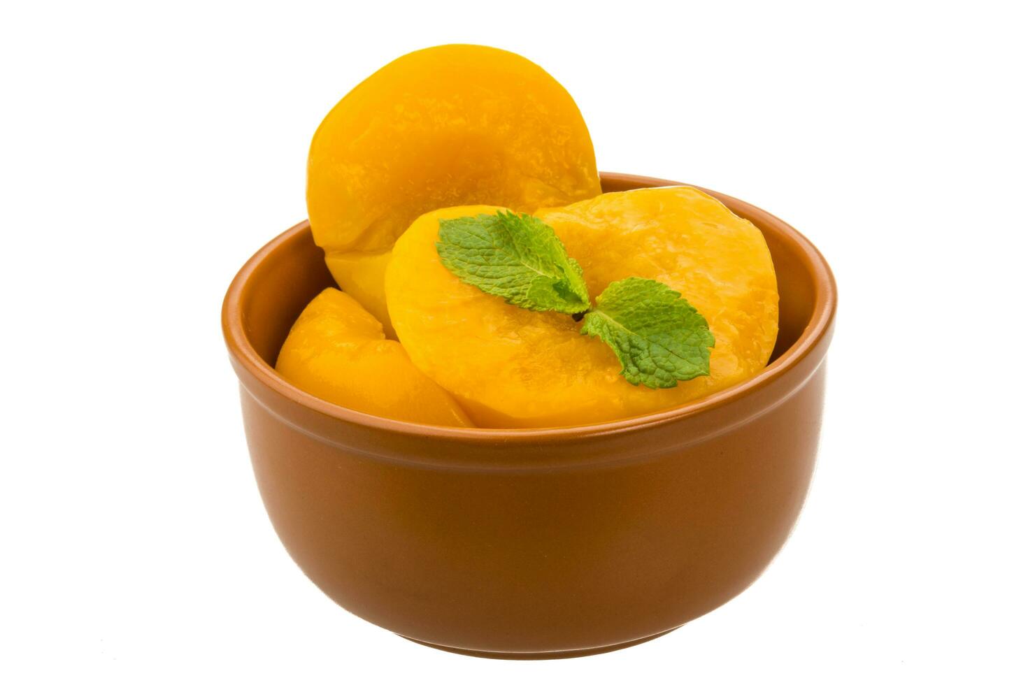 Marinated peaches dish view photo