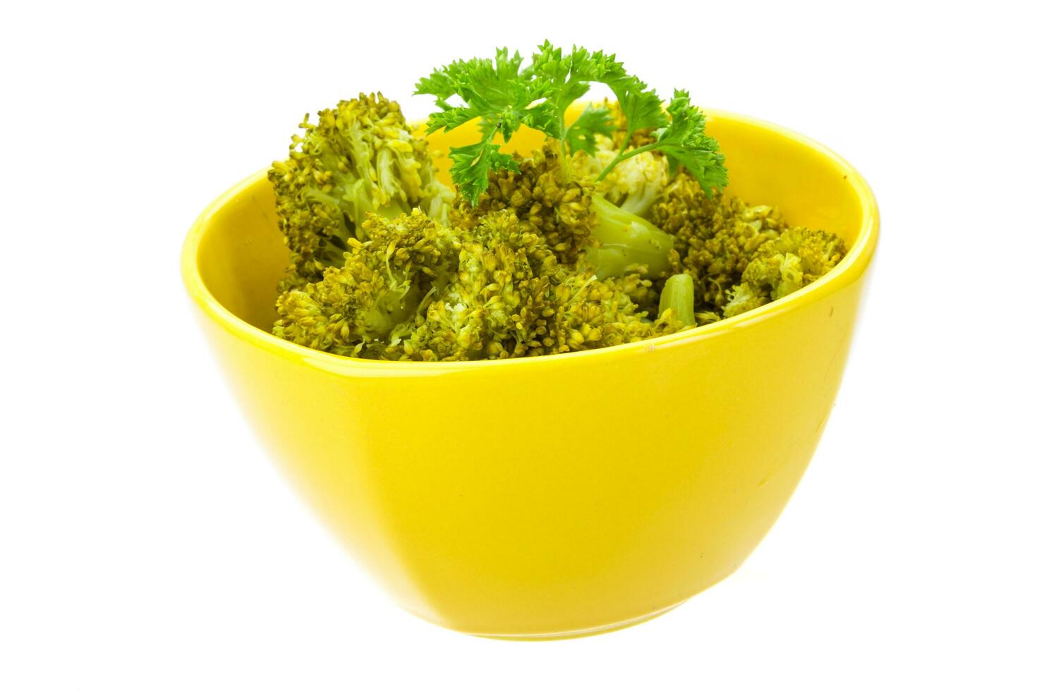 Boiled cauliflower in a bowl on white background photo