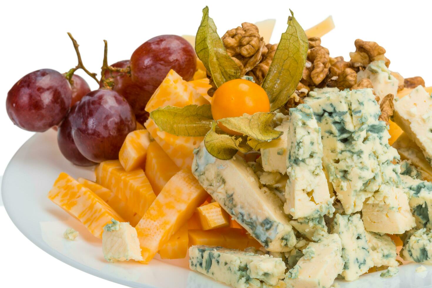 Cheese assortment on the plate and white background photo