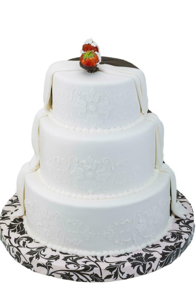Wedding cake on white background photo