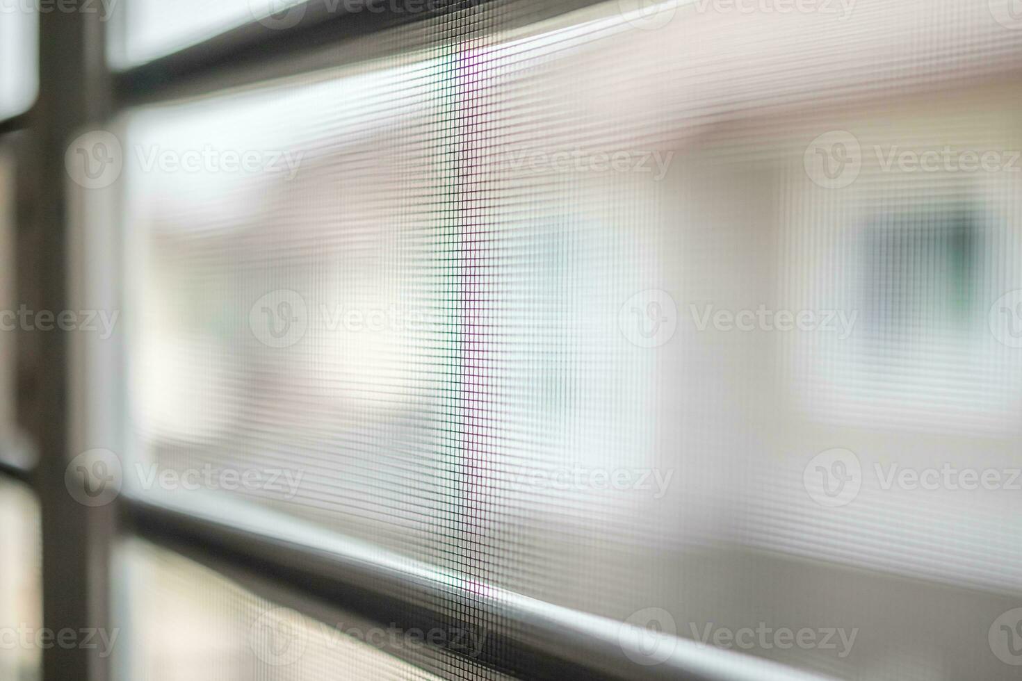 mosquito net wire screen on house window protection against insect photo