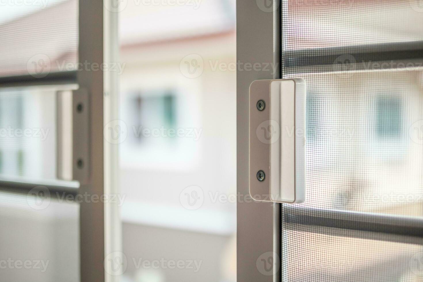 mosquito net wire screen on house window protection against insect photo