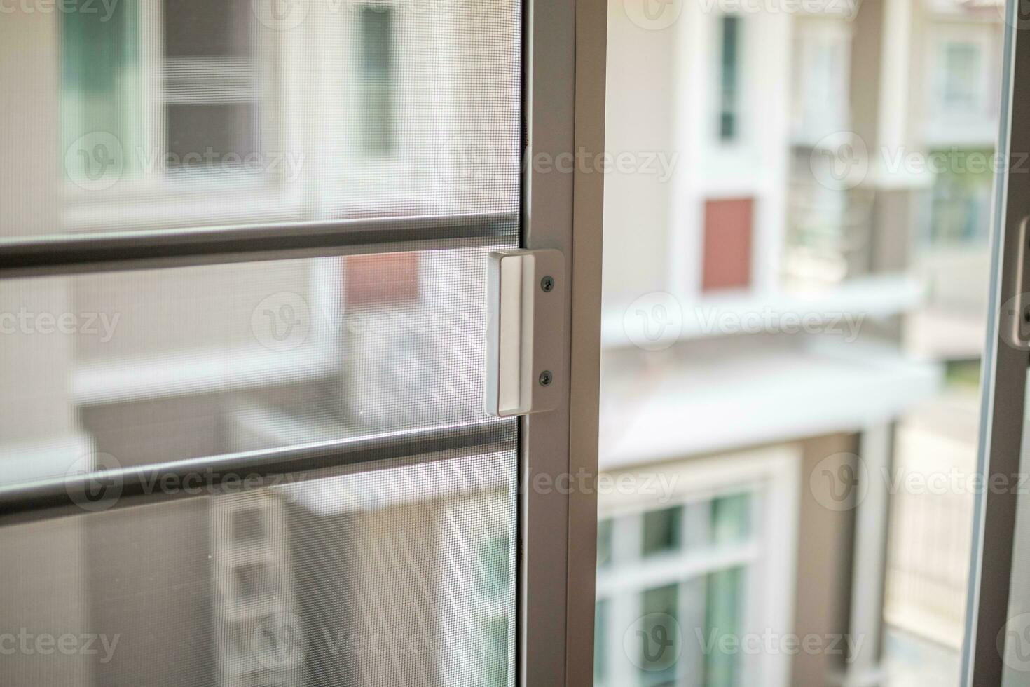 mosquito net wire screen on house window protection against insect photo