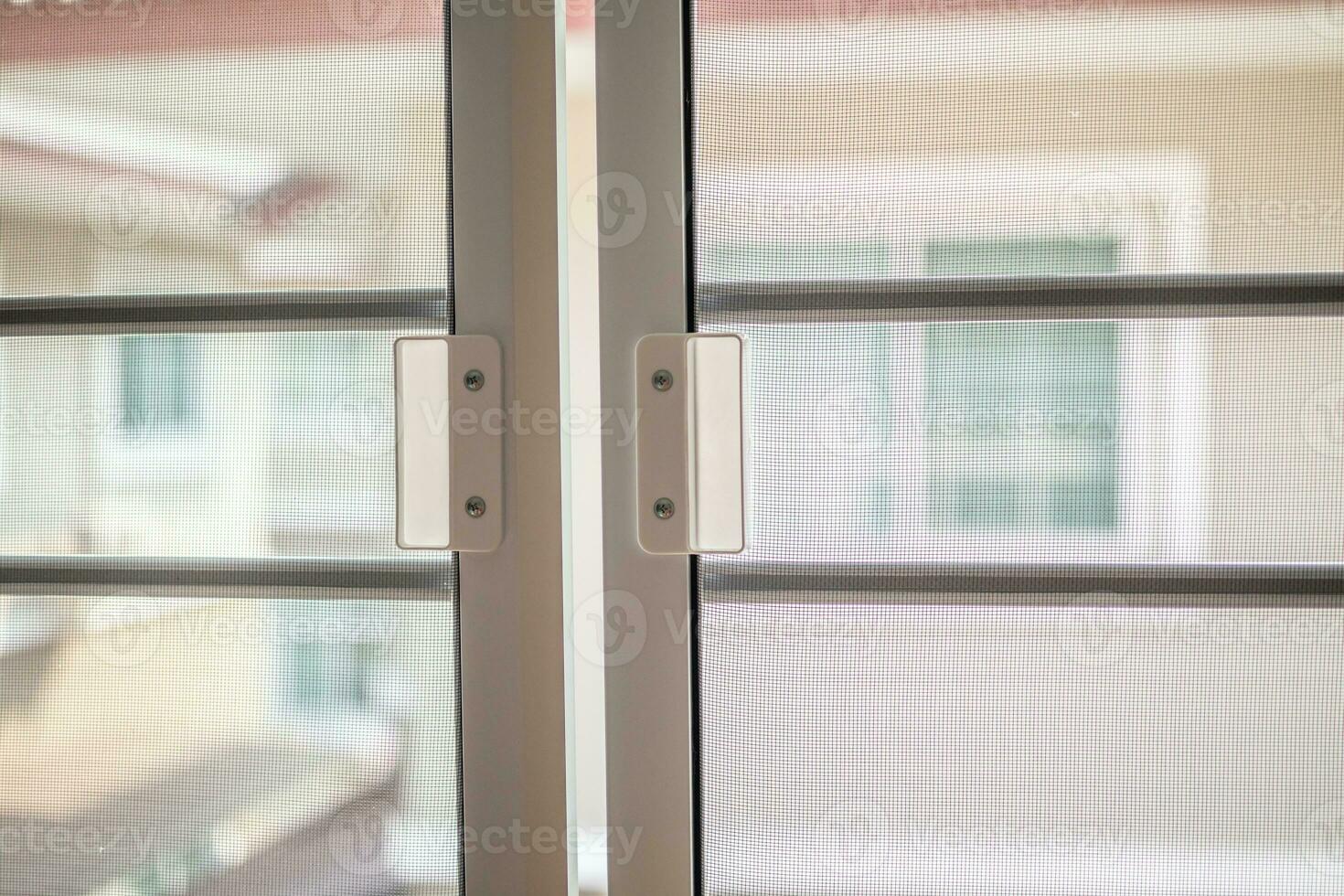 mosquito net wire screen on house window protection against insect photo