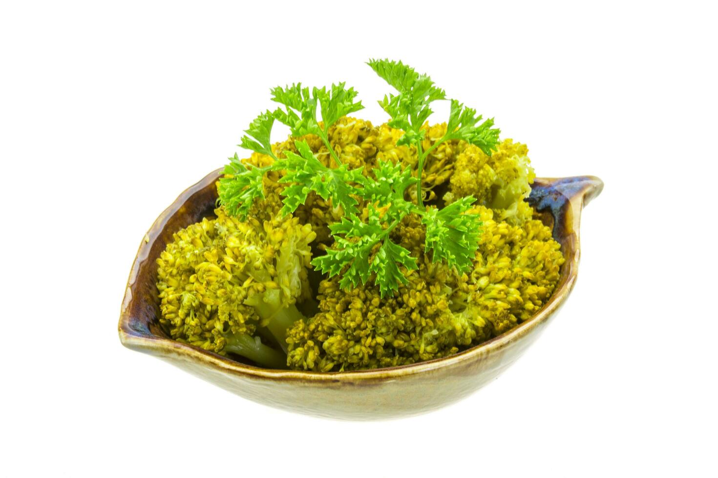 Boiled cauliflower in a bowl on white background photo