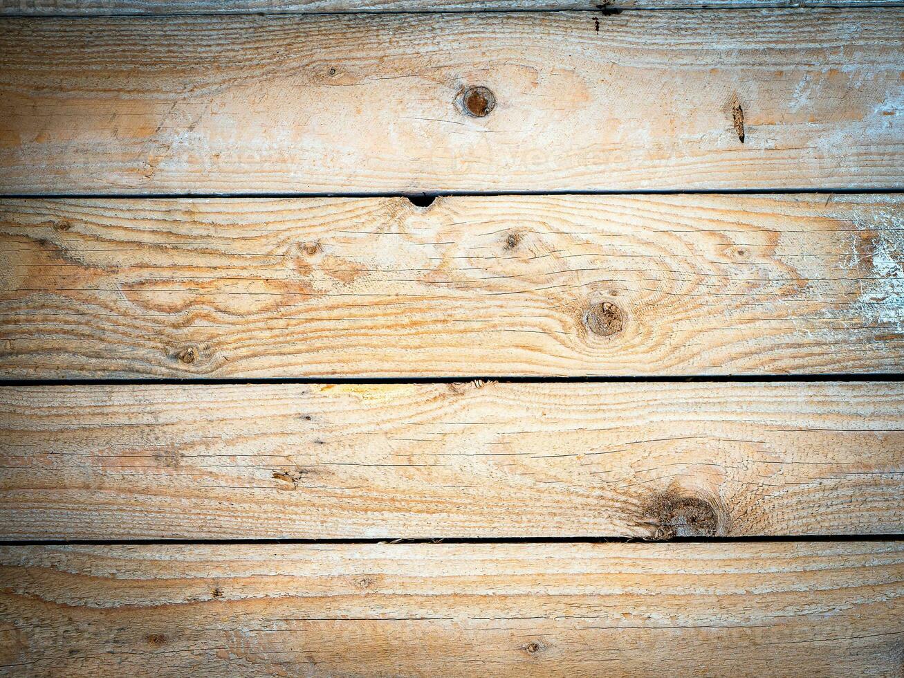 Rough light colored wooden planks texture. Plank bench texture photo