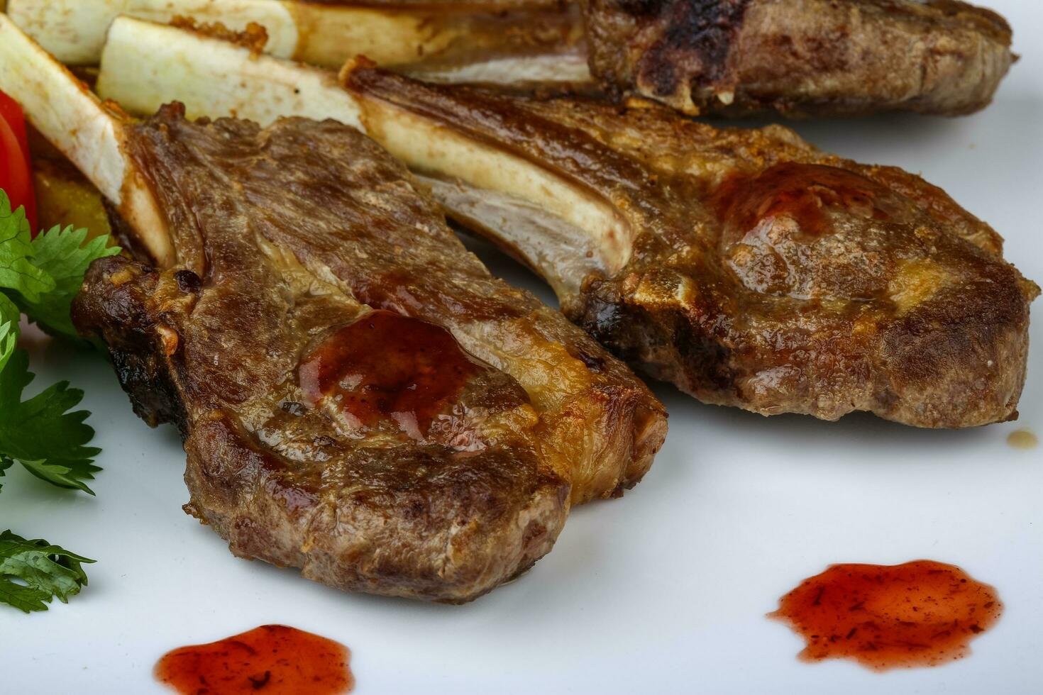 Lamb chops on the plate photo