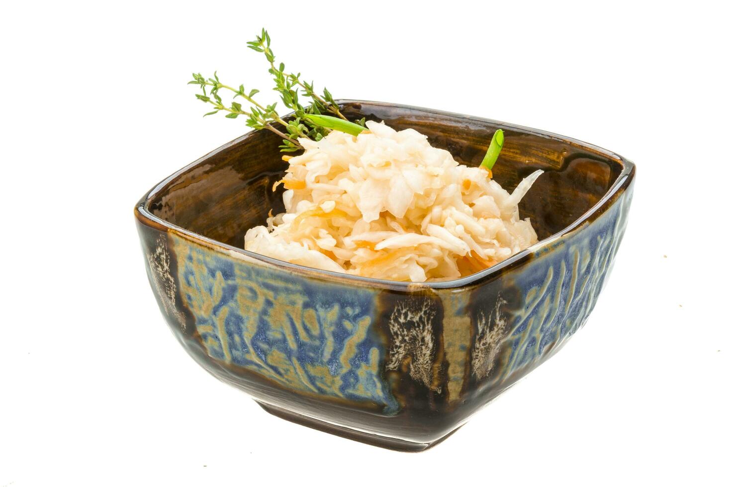 Fermented cabbage on white photo