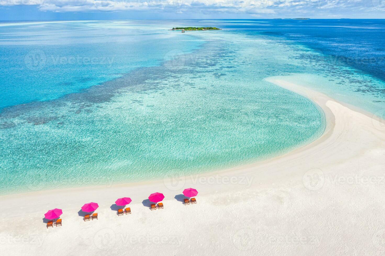 Amazing tranquil sea sand sky. Recreational summer travel tourism. Aerial landscape view with chairs and umbrellas on paradise island beach, seaside. Resort vacation, exotic nature. Beautiful tropics photo