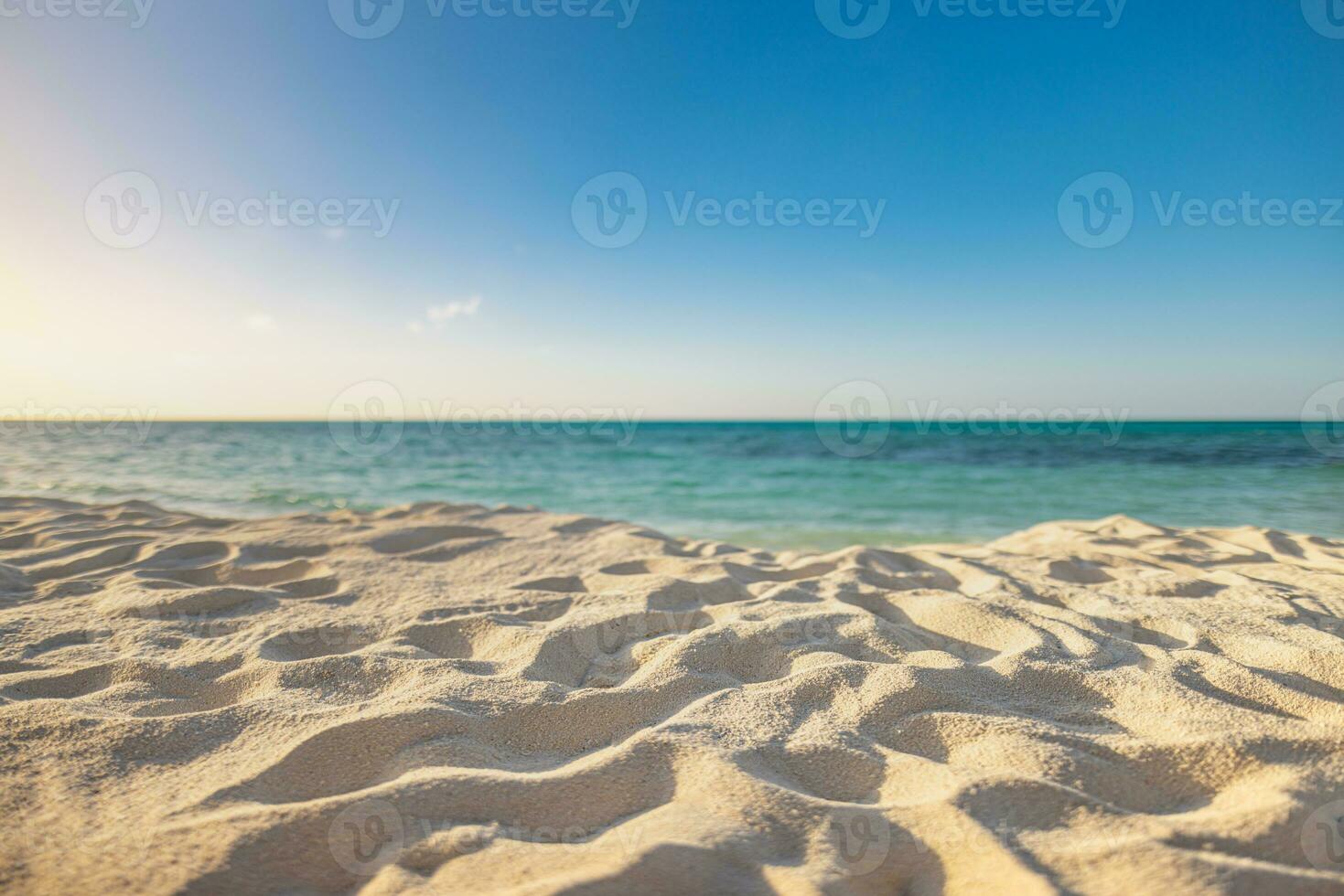 Closeup sea sand beach. Panoramic beach landscape. Inspire tropical beach seascape horizon. Orange and golden sunset sky calmness tranquil relaxing sunlight summer mood. Vacation travel holiday banner photo