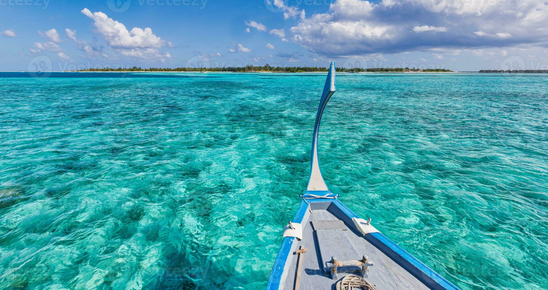 Amazing Maldives beach design. Maldives traditional boat Dhoni front. Perfect blue sea with ocean lagoon. Luxury tropical paradise concept. Beautiful vacation travel landscape. Tranquil ocean lagoon photo