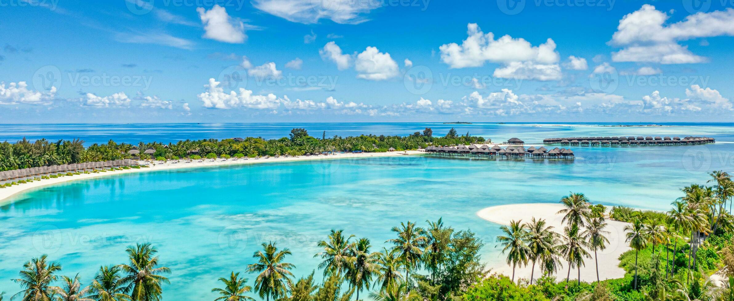 Amazing island beach. Maldives from aerial view tranquil tropical landscape seaside with palm trees on white sandy beach. Exotic nature shore, luxury resort island. Beautiful summer holiday tourism photo
