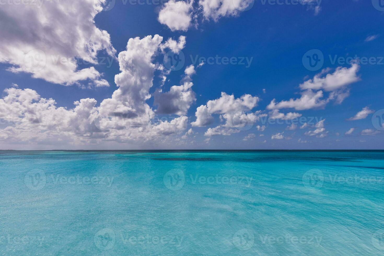Perfect sky and ocean. Endless seascape, freedom ecology nature concept. Blue sea water. Ocean surface natural background on blue sky. Tropical seaside, horizon, idyllic skyline, tranquil skyscape photo