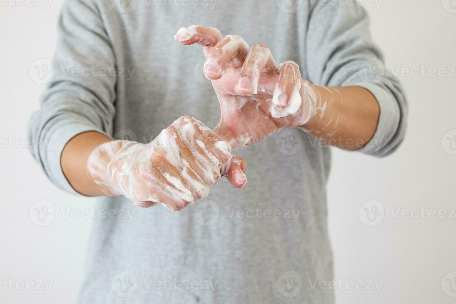 Man wash hands with soap for COVID-19 corona virus prevention concept photo