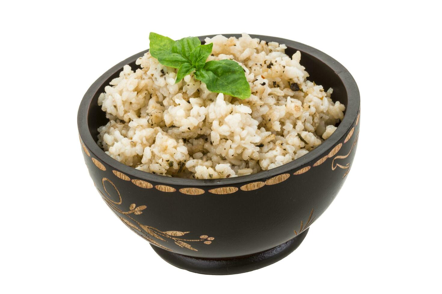 Boiled rice in a bowl on white background photo