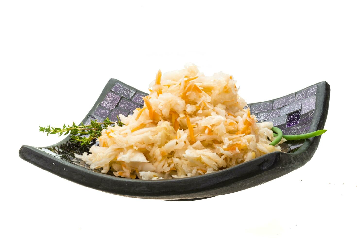 Fermented cabbage on white photo