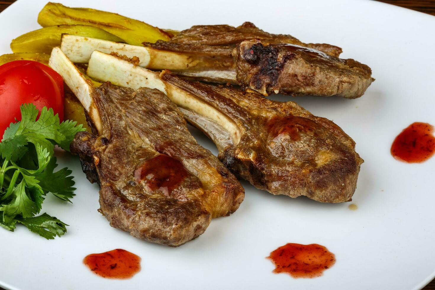 Lamb chops on the plate photo