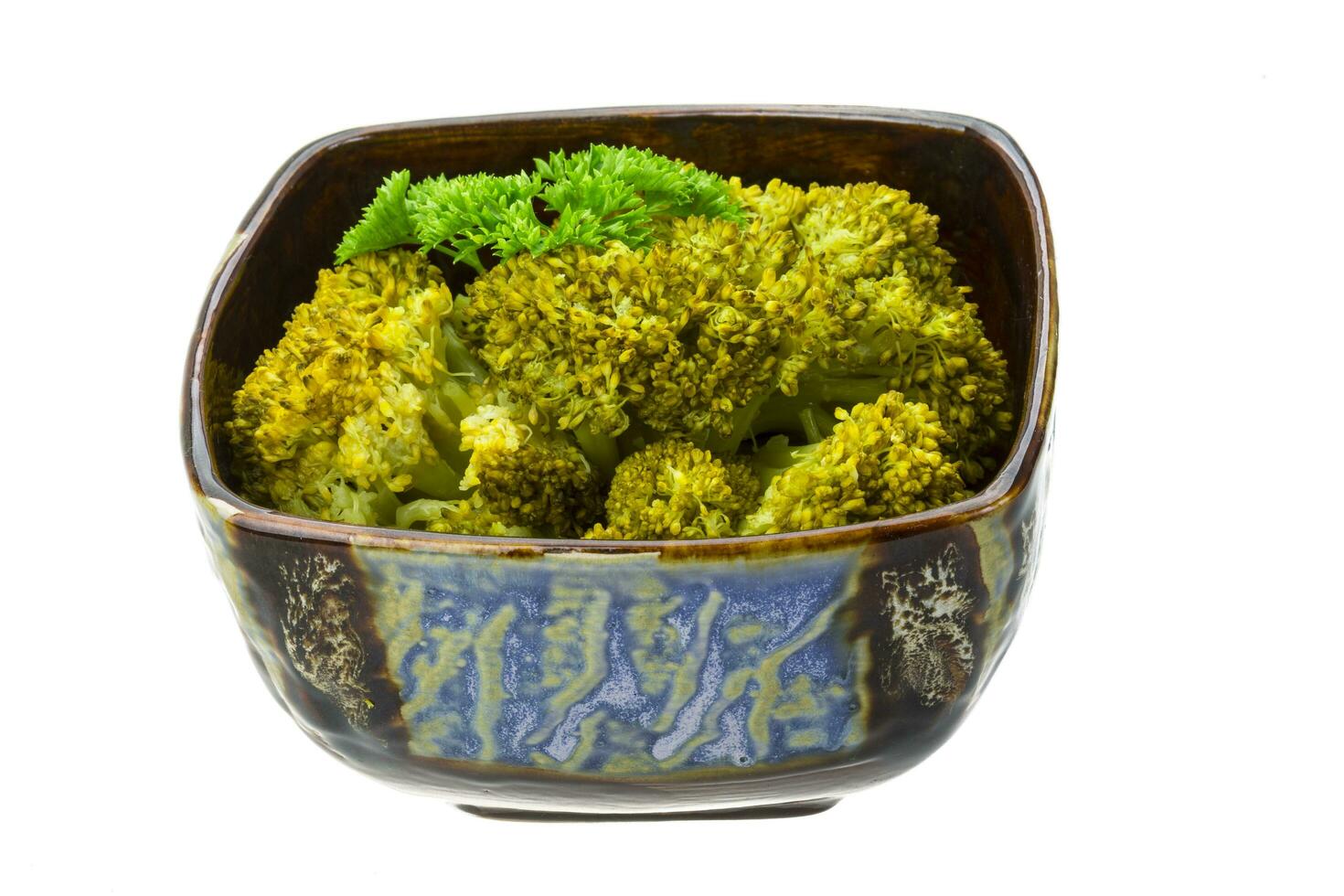 Boiled cauliflower in a bowl on white background photo