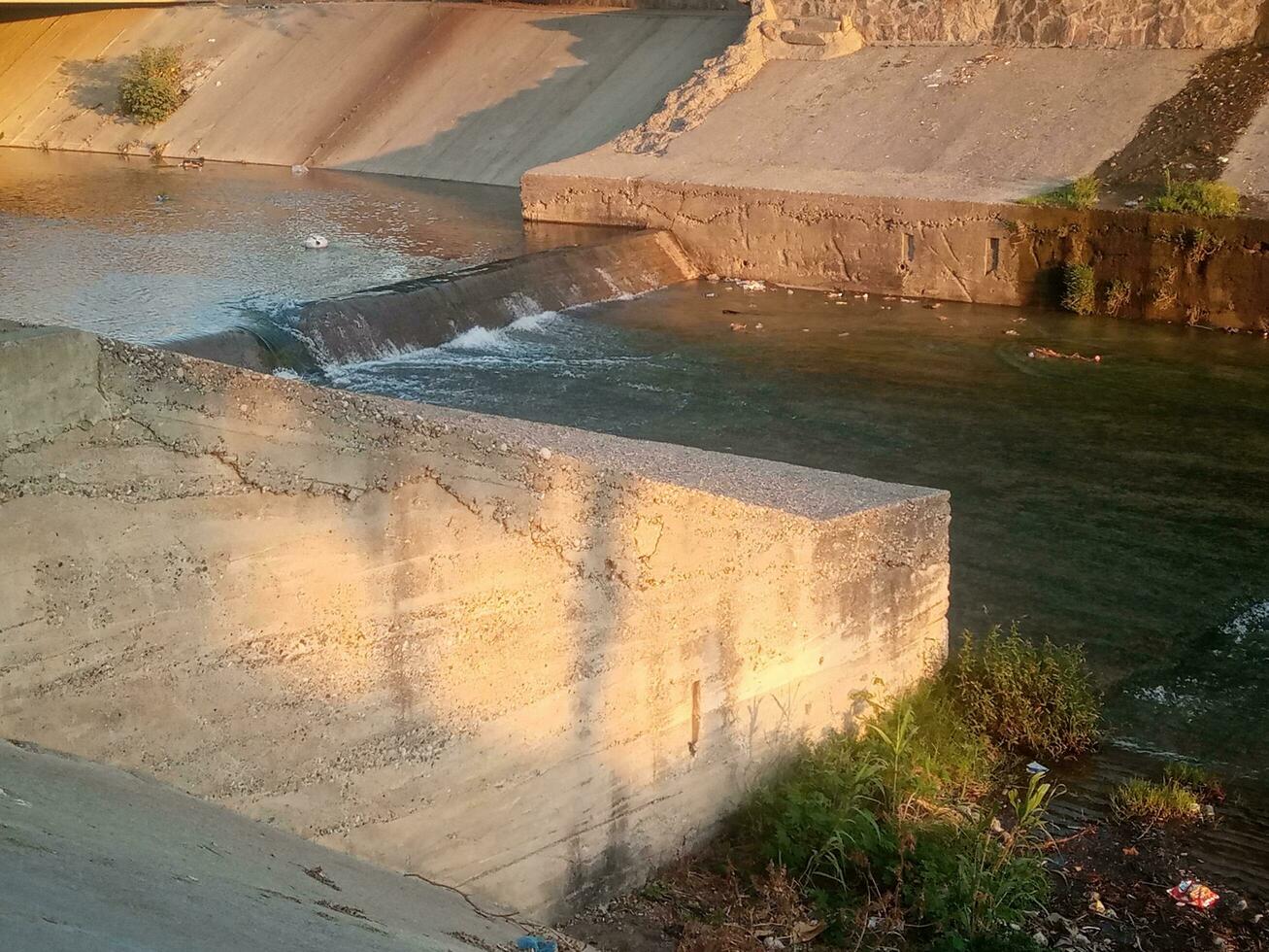 Water falls inside city photo