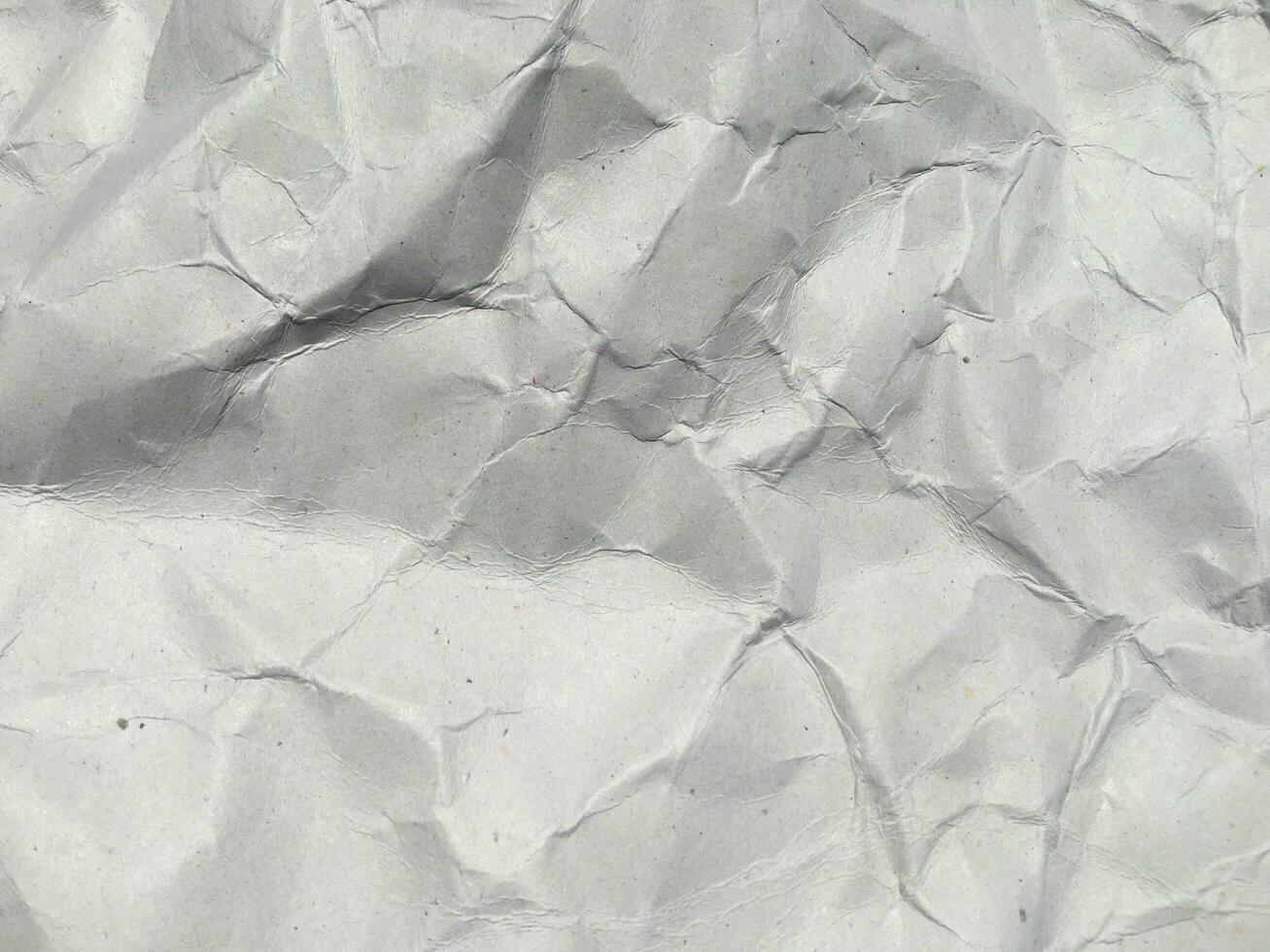 Top view of white crumpled paper texture background. Copy space for design and artwork photo