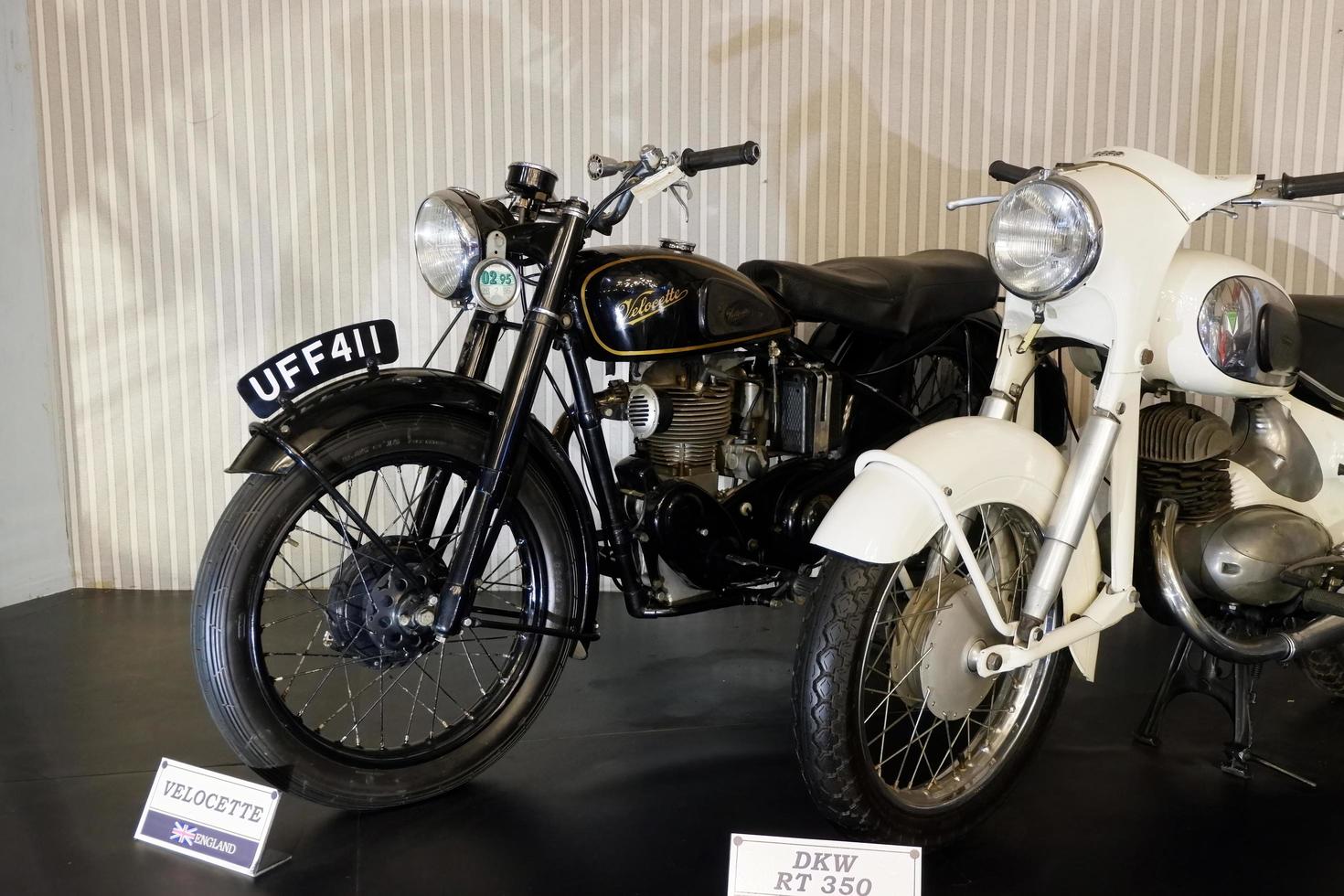 Batu, East Java, Indonesia - August  10, 2022, Two Motorcycle, Uff411 Vellocette, DKW RT50, Antique black and White motorcycle in Angkut museum photo