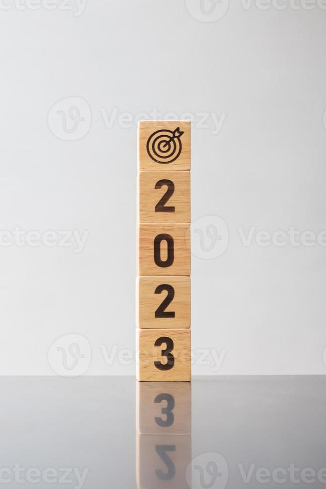 2023 block with dartboard sign. Business Goal, Target, Resolution, strategy, plan, Action motivation, mission, thinking, and New Year start concepts photo