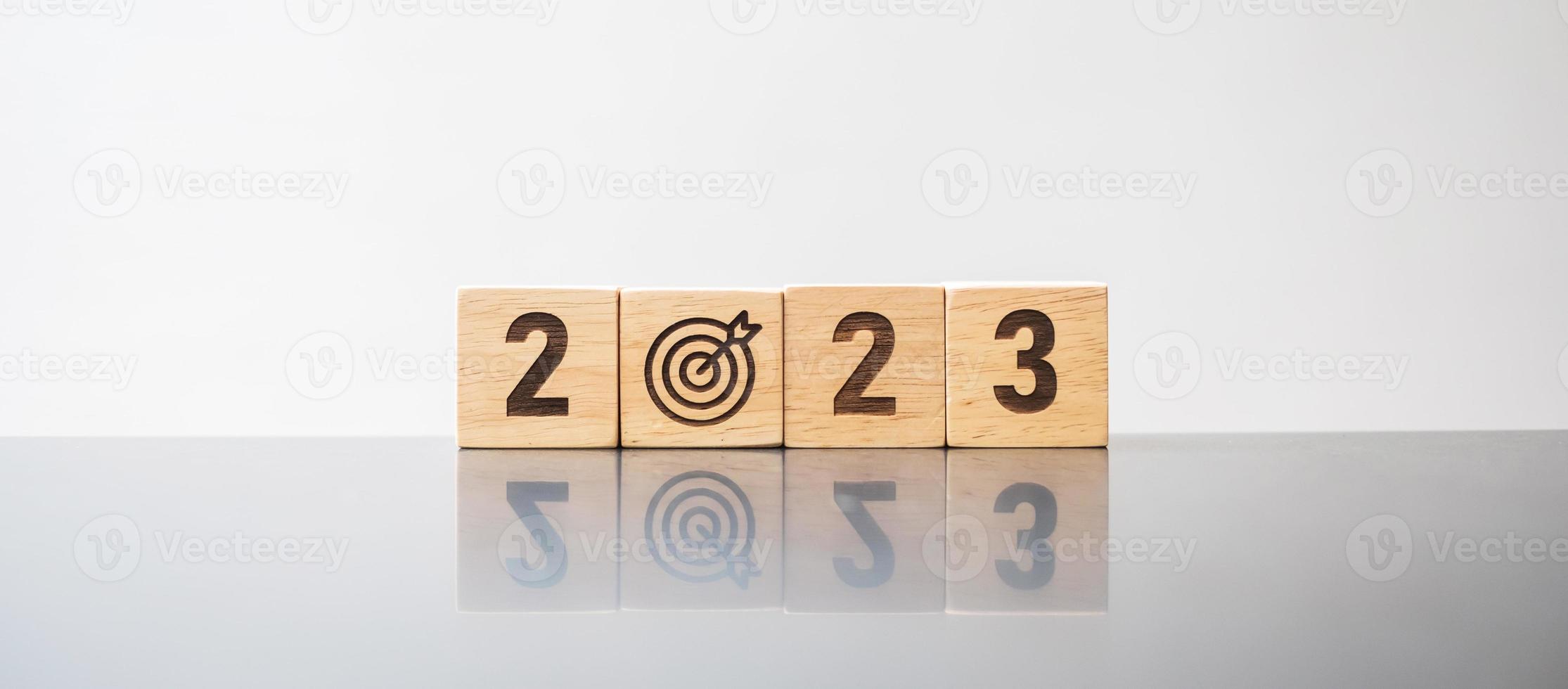 2023 block with dartboard sign. Business Goal, Target, Resolution, strategy, plan, Action motivation, mission, thinking, and New Year start concepts photo