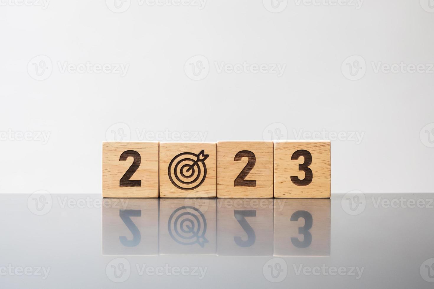 2023 block with dartboard sign. Business Goal, Target, Resolution, strategy, plan, Action motivation, mission, thinking, and New Year start concepts photo