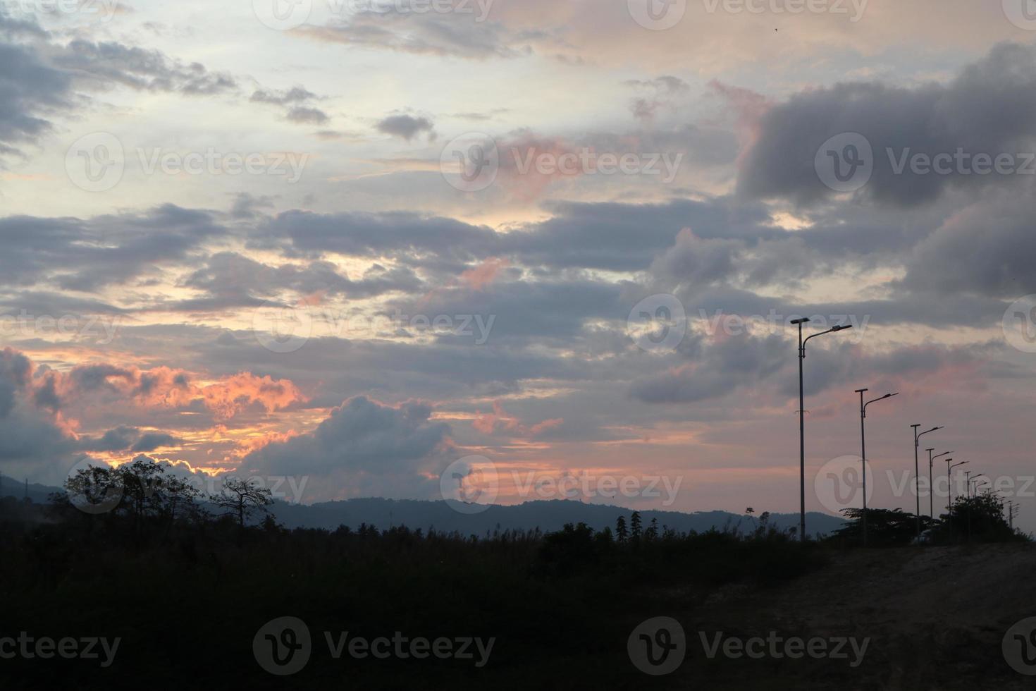 the beauty of the orange sky. Colorful cloudy sky at sunset. Gradient color. Sky texture, abstract nature background photo