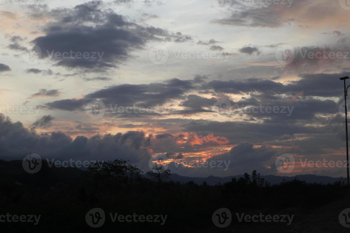 the beauty of the orange sky. Colorful cloudy sky at sunset. Gradient color. Sky texture, abstract nature background photo