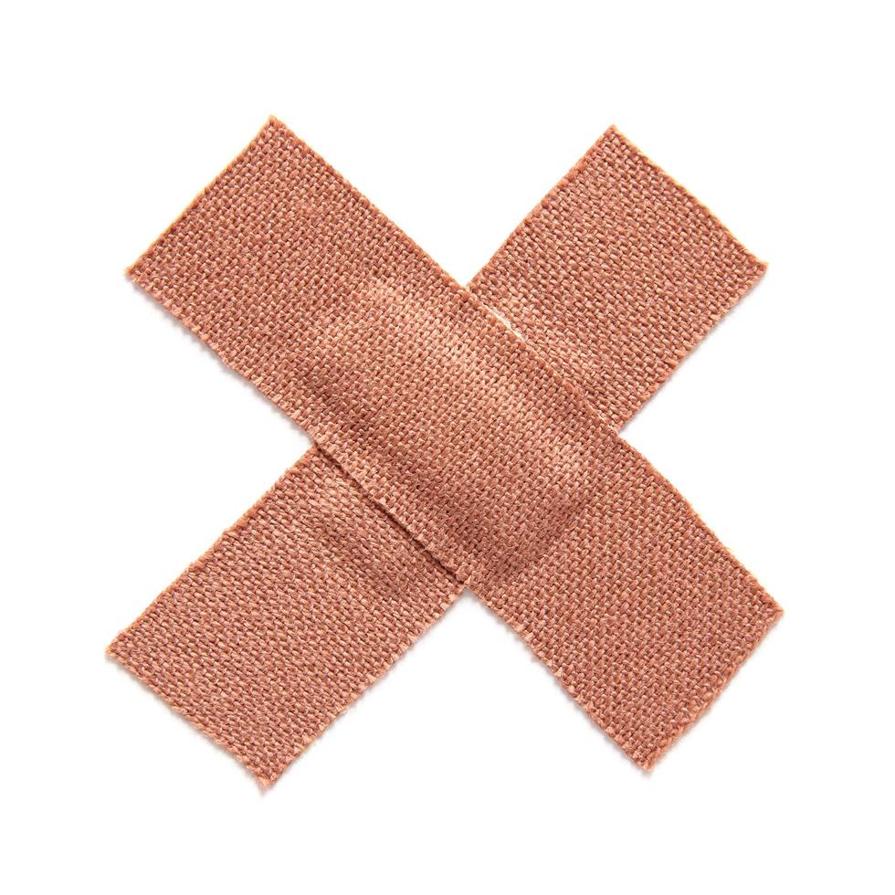First aid plaster isolated on white background photo