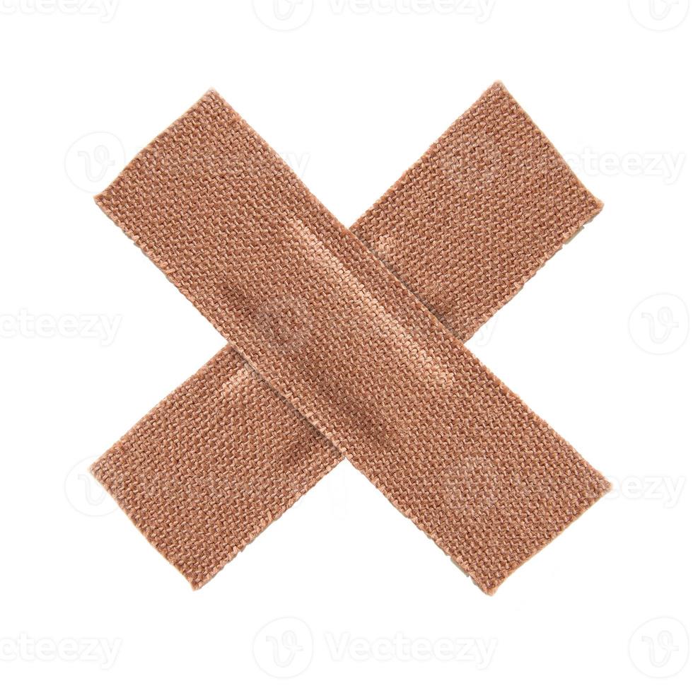 First aid plaster isolated on white background photo