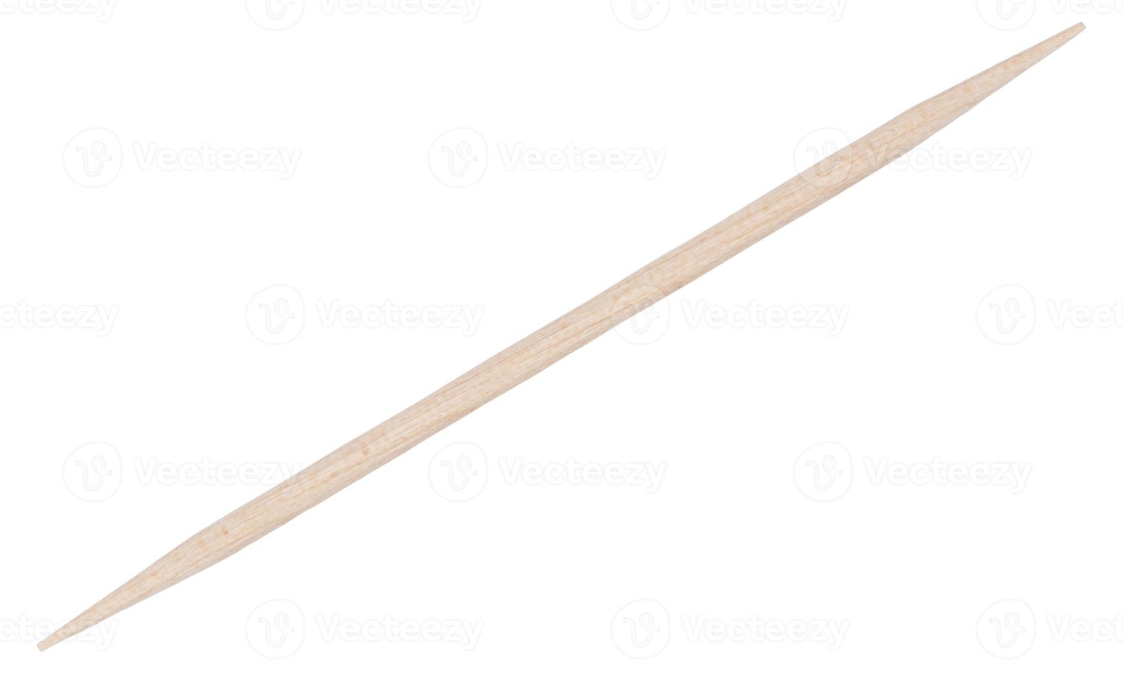 Wooden toothpick on white background photo