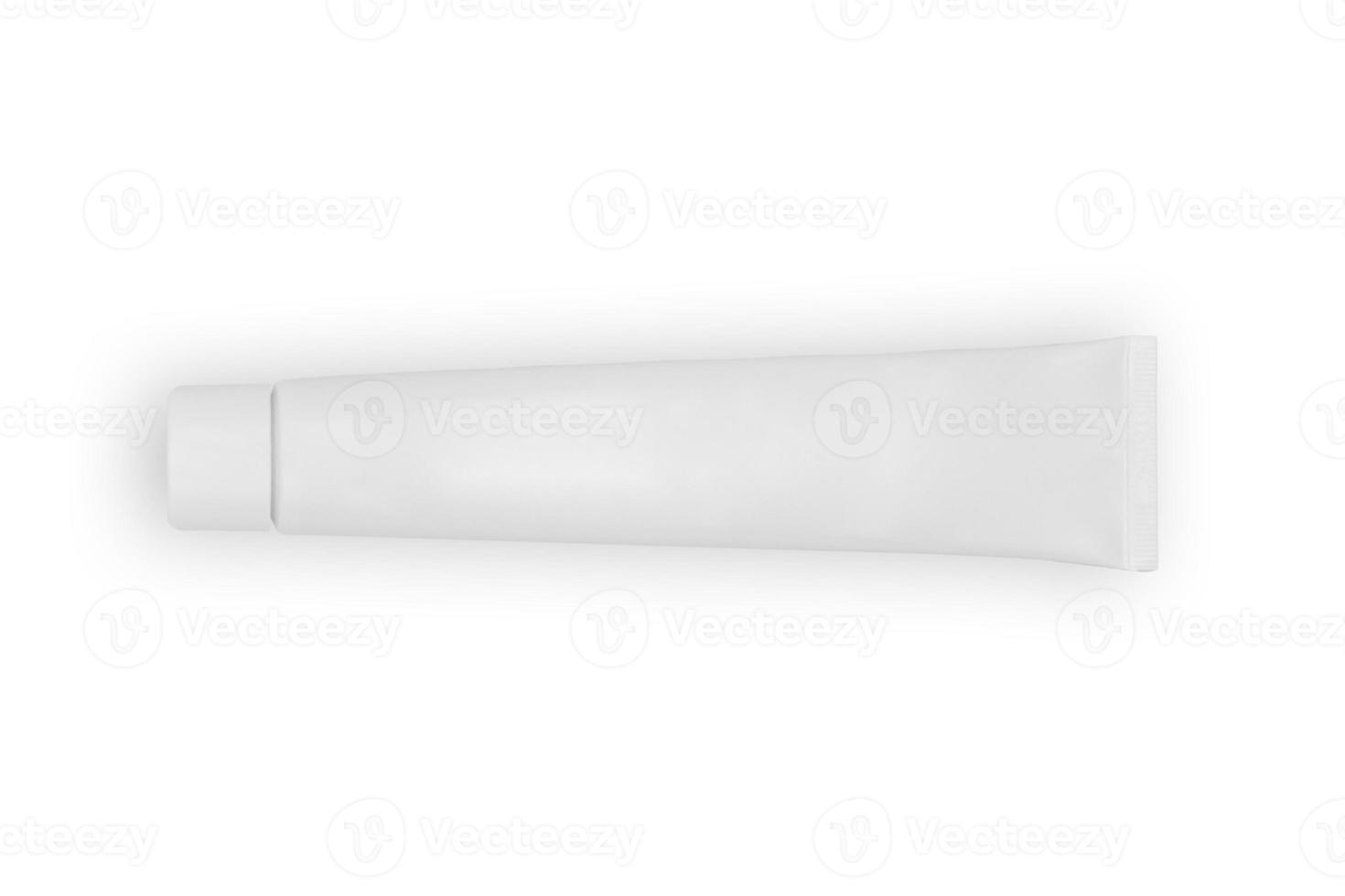 Blank white toothpaste tube isolated on white background photo