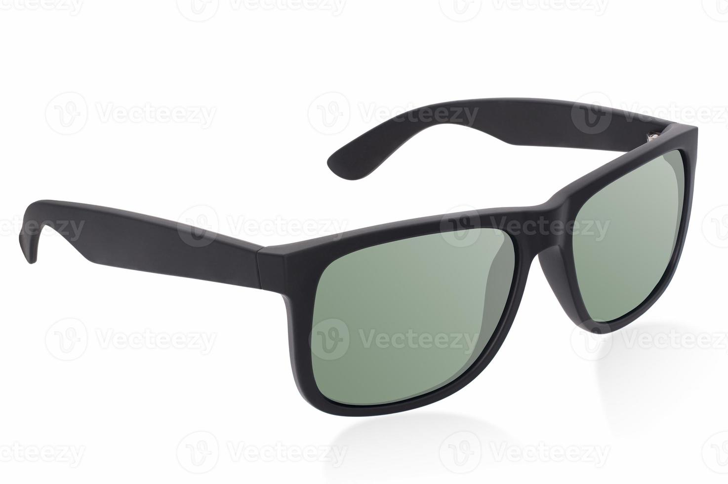 Plastic frame black matt sunglasses with green polarised lenses on white background with shadow reflection photo