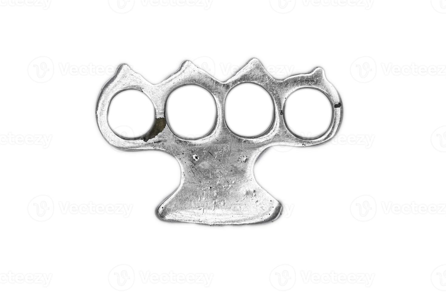 Brass Knuckle used and worn isolated on white background photo
