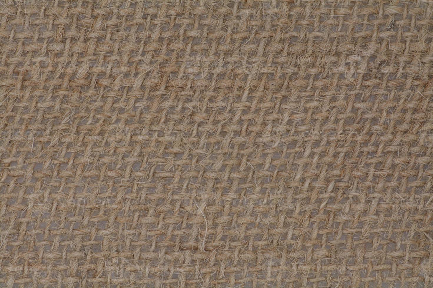 Burlap natural fabric, close-up of textile background photo