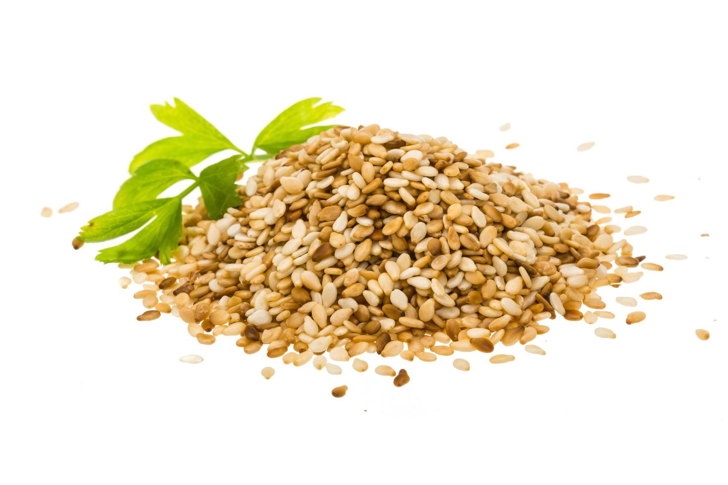 Sesam seeds on white background photo