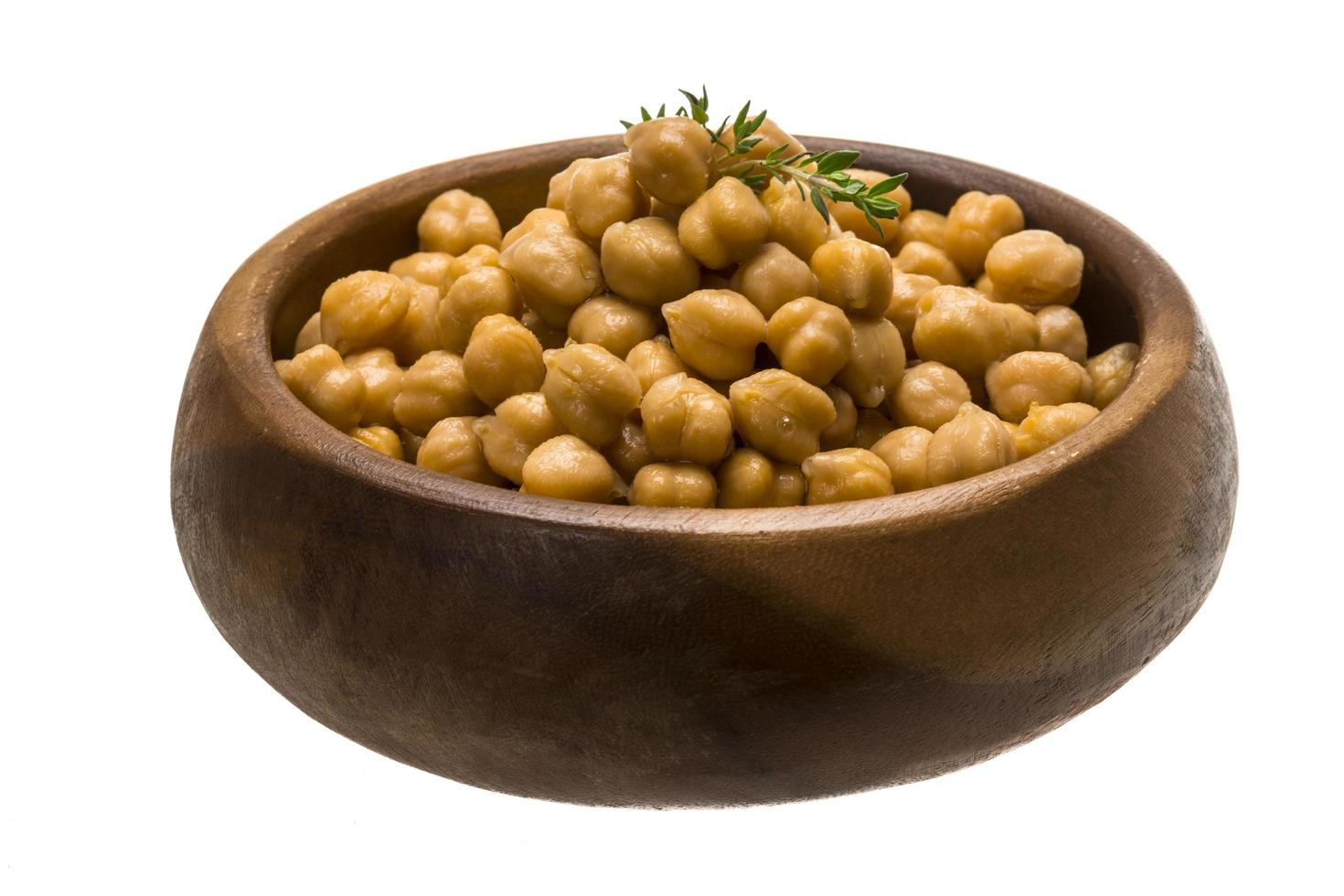 Chickpea in a bowl on white background photo