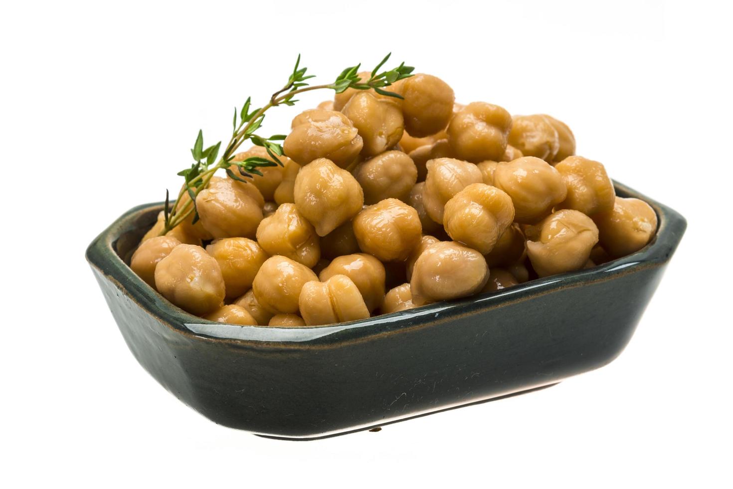 Chickpea in a bowl on white background photo