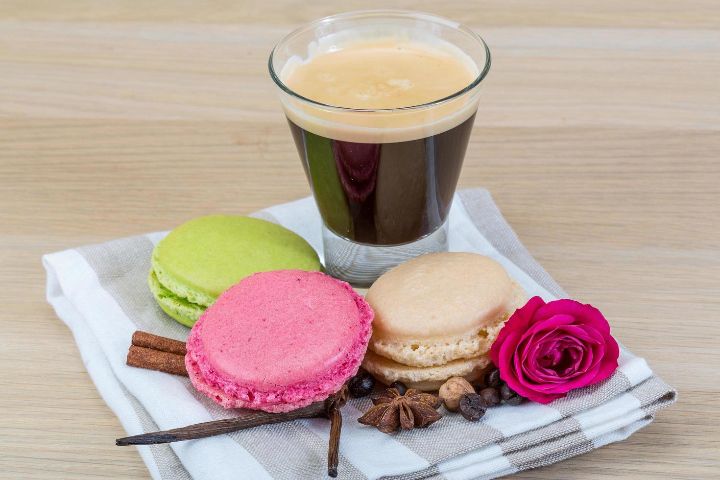 Macaroons delicious on wooden background photo