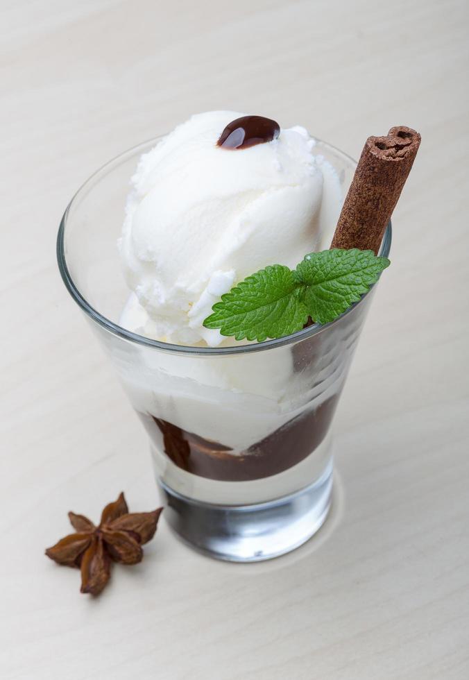 Ice cream on wooden background photo